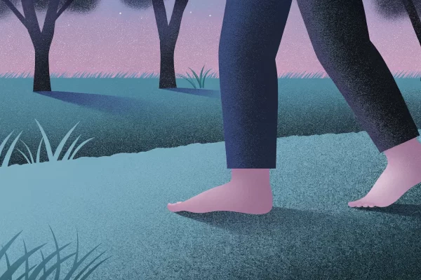 Illustration of bare feet walking on a path in a grassy field at dusk, with silhouetted trees and a gradient sky from pink to purple.